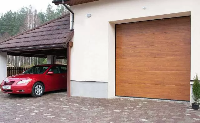 картинка Автоматические подъемные секционные гаражные ворота ALUTECH Trend 3000×2375 мм от магазина Охранных систем и видеонаблюдения